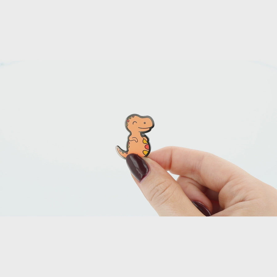 Chubby Orange Dinosaur Enamel Pin